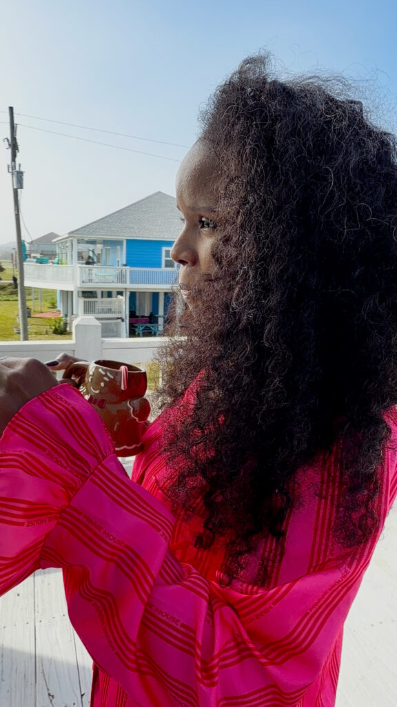 Lifestyle blogger capturing a reflective moment during a personal reset. This image represents growth, identity shifts, and stepping into a new chapter of womanhood and self-discovery.