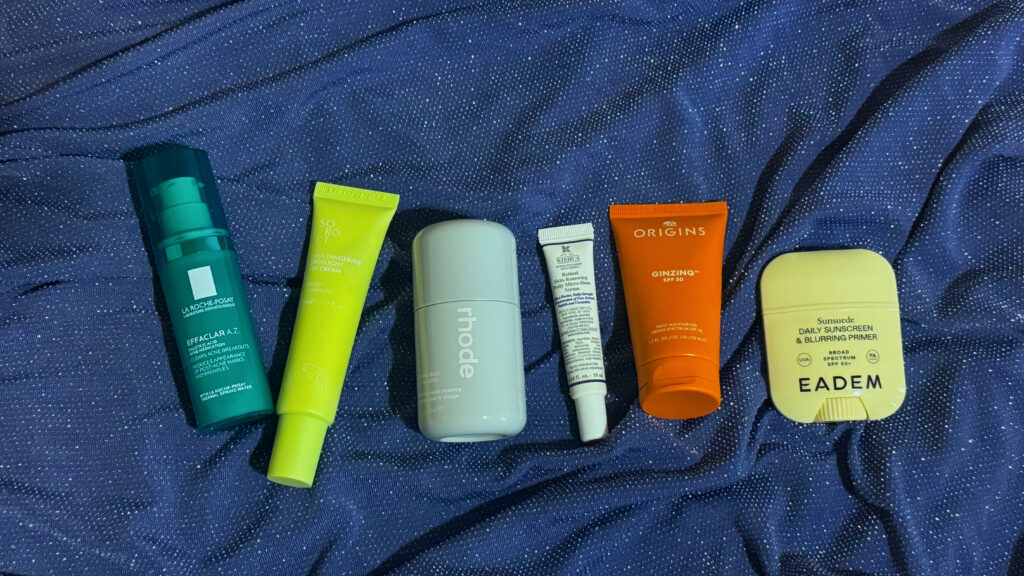 Morning skincare lineup featuring La Roche-Posay Effaclar, Soroci eye cream, Rhode Glazing Milk, Kiehl’s Retinol Skin-Renewing Micro-Dose Serum, Origins GinZing SPF 30, and EADEM Daily Sunscreen for combination acne-prone skin.