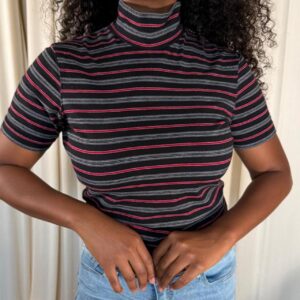 Energie Y2K striped short sleeve turtleneck top in black, charcoal gray, and red.