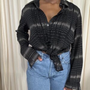 Liz Claiborne black and ivory abstract print blouse with gathered front, modeled with blue jeans